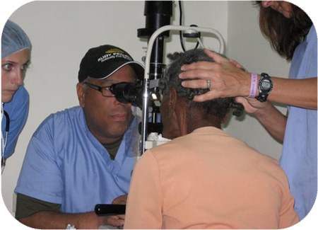 Dr. Cross giving an eye exam