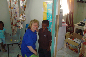 Measuring a boy's height in Jamaica