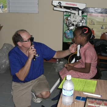 Dr. Edwards performs an eye exam